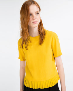TOP WITH PLEATED HEM